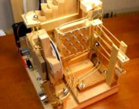 The compact marble machine (игрушка с шариками)